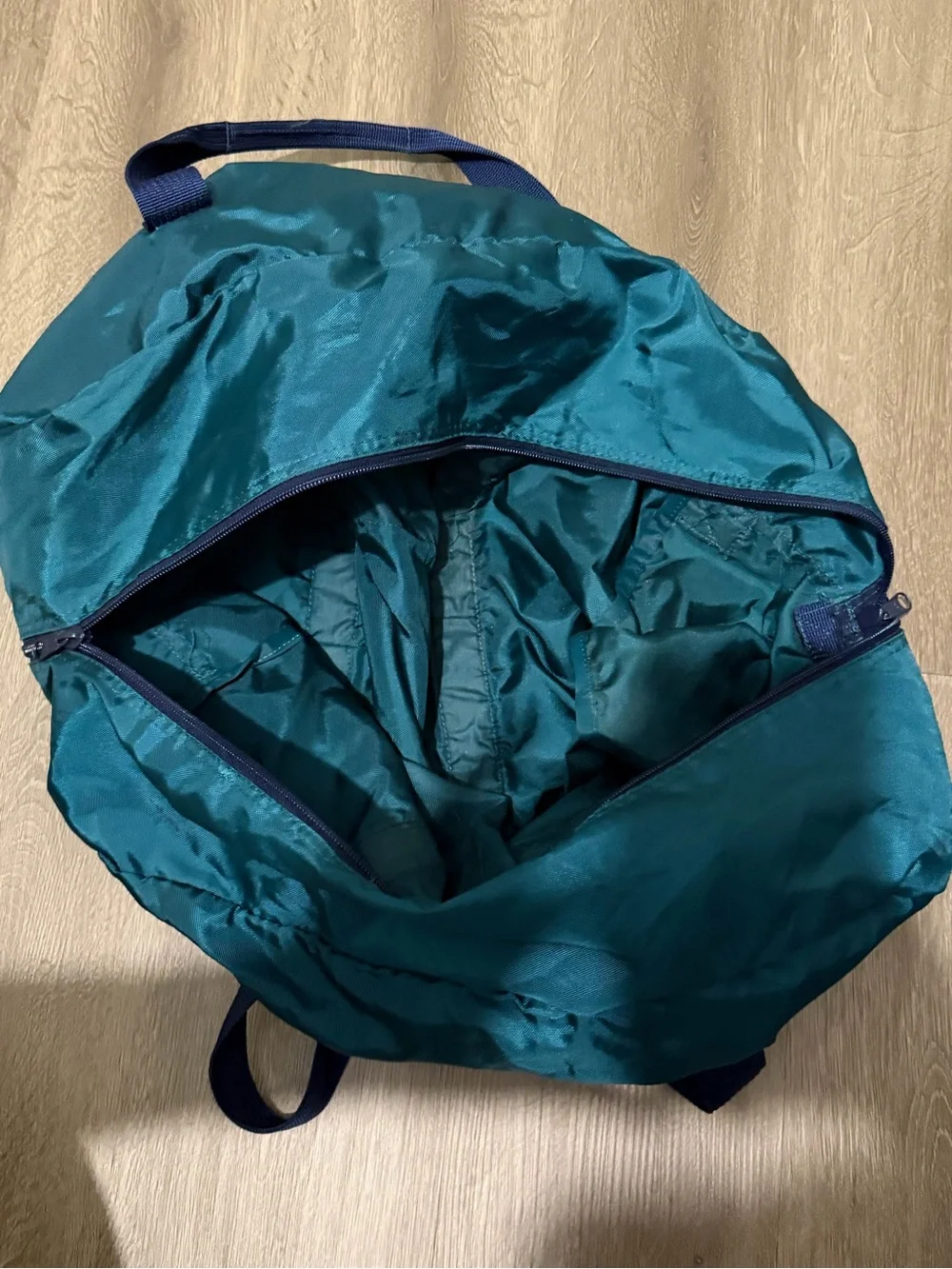 Vintage Nike Teal Duffel Bag with Red Logo